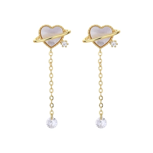 Elegant gold heart earrings with white shell inlay, Saturn ring design, and crystal tassels