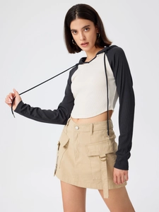 Women's color block hooded long sleeve crop top with khaki utility style mini skirt