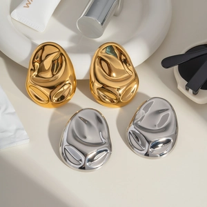 Polished 18K gold and silver geometric oval earrings with melted liquid metal texture