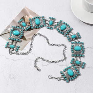 Detail of silver alloy waist chain with turquoise inlays and butterfly metal ornaments