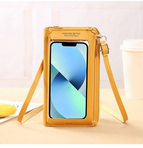 Detail view of yellow PU leather phone bag featuring a clear touchscreen window and strap