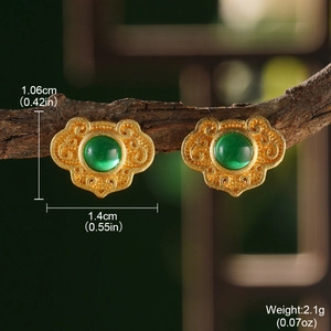 Detail view of retro Chinese style gold hollow earrings with green stones and dimensions