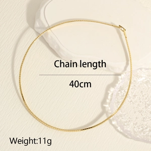 Close-up of 18K gold plated snake bone chain showing 40cm length and 11g weight