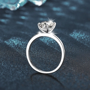 Elegant 925 sterling silver oval moissanite ring with a brilliant halo and starburst effect