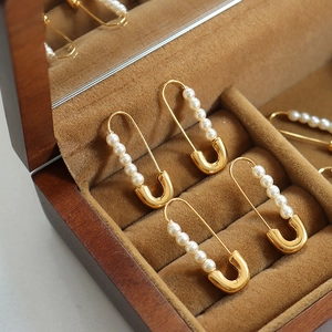 18K gold plated paperclip earrings with elegant pearls displayed in a wooden jewelry box