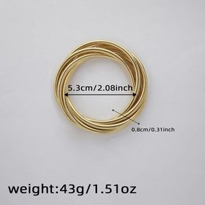 Detailed view of layered gold spring bracelet with 5.3cm inner diameter and size labels