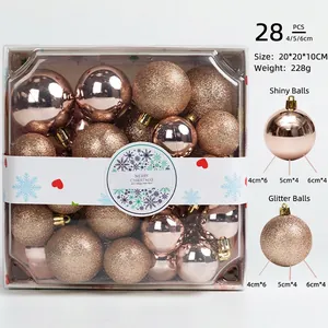 Detail of 28pcs rose gold Christmas ball set in shiny and glitter finishes in clear box