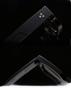 Detail of high-quality metal hinges and gear decorations on black square sunglasses