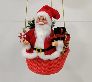 Detail of Santa Claus in a red basket with candy cane for Christmas decor