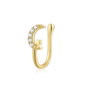 Detailed view of gold moon and star non-piercing nose cuff with white zircon stones