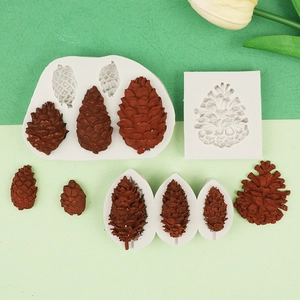 Detail view of pinecone silicone fondant molds with realistic 3D textured results