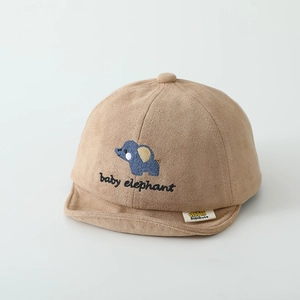 Detailed view of baby khaki suede cap featuring a blue elephant embroidery and soft brim