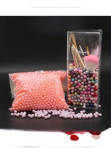 Macro detail of mixed color 3-10mm ABS pearls without holes for DIY craft decoration
