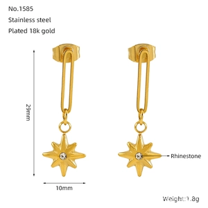 Detail view of 18k gold plated stainless steel star earrings with rhinestone and size info