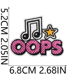 Detail view of OOPS embroidery patch with music notes and stars showing 5.2x6.8cm size