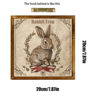 Close-up of vintage Easter rabbit wooden frame featuring a sawtooth metal wall hook