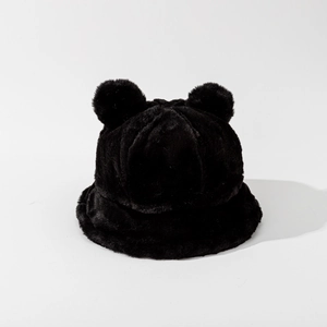 Detail of plush black teddy bear ear bucket hat with soft faux fur texture and warm design