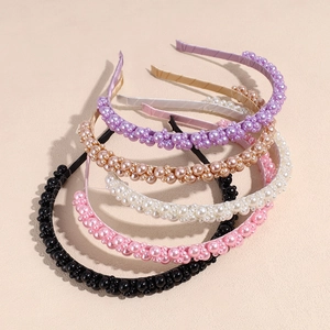 Elegant set of five colorful pearl beaded headbands in pastel tones and silk fabric