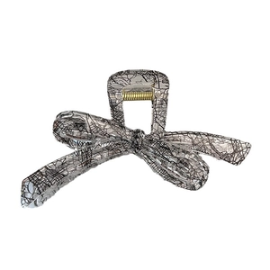 Transparent lace bow hair claw clip with black mesh pattern and gold spring