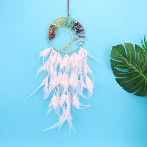 Tree of Life dream catcher with colorful natural stones and soft pink feathers