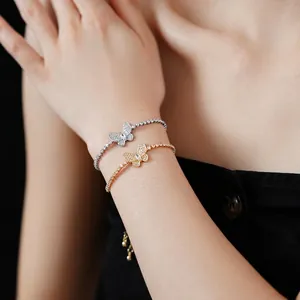 Adjustable butterfly tennis bracelets with sparkling zircons in silver and gold metal finishes