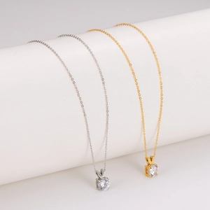 Minimalist V-shape necklaces with round zircon pendants in silver and gold finishes