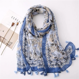 Vintage floral linen scarf in light blue with elegant tassels for women's sun protection