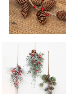 Close-up of Christmas rattan ornaments featuring pine needles, pinecones, and red berries