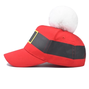 Red Christmas Santa baseball cap with plush pom-pom and gold buckle print on white background