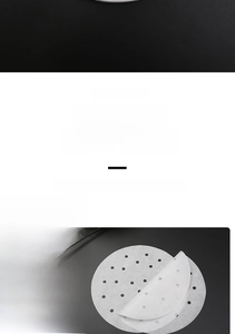 Detail of round perforated silicone oil steamer paper made from food grade wood pulp