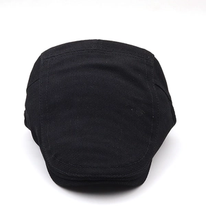 Detail shot of breathable black mesh fabric on a sun protection outdoor baseball cap