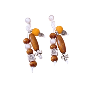 Retro beaded earrings with dark wood beads, white pearls and silver cross pendant
