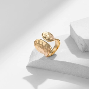 Hammered texture gold plated open ring featuring an asymmetric chunky minimalist design