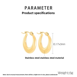Macro detail of 17mm gold stainless steel C-shape earrings with size and weight specs