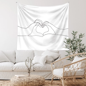 Detailed texture of minimalist line art wall tapestry featuring a heart hands design
