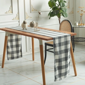 Nordic minimalist gray and white plaid table runner with tassels for Christmas decor