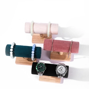 Velvet cylinder jewelry display stands for watches and bracelets with wooden bases