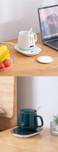 Detail view of electric mug warmer set with ceramic cup, lid and spoon in white and dark green