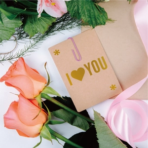Golden I Love You letter stickers on kraft card with red roses and silk ribbons