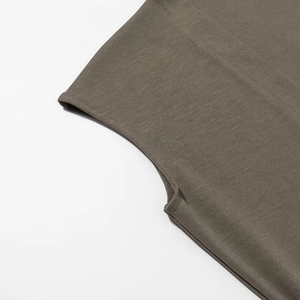 Detailed macro view of the dark taupe knit fabric with precise double-needle stitching
