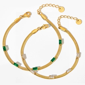 Gold stainless steel snake chain bracelet set with green emerald-cut zircon and white stones