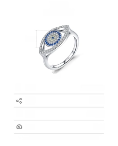 Macro shot of 925 sterling silver evil eye ring with blue and white zircon pavé details