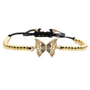 Golden butterfly bracelet with blue rhinestones and adjustable black rope cord
