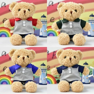 Four plush teddy bears wearing colorful polo shirts in a vibrant creative studio