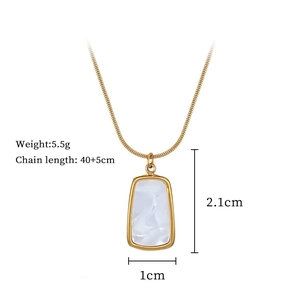 Detail view of gold square shell pendant necklace showing 40+5cm chain length and size specs