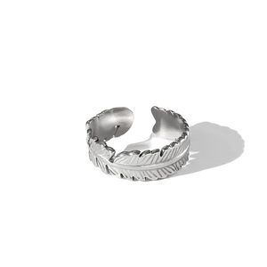 Polished silver stainless steel feather ring with adjustable open design on white background