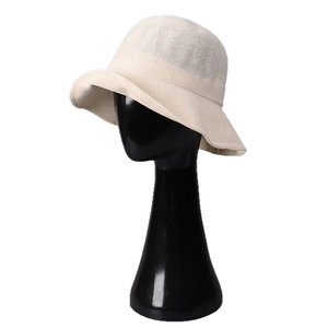 Elegant off-white woven sun hat for women featuring a breathable wavy brim for summer