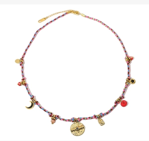 Close-up of Bohemian colorful braided necklace with 18K gold-plated celestial pendants