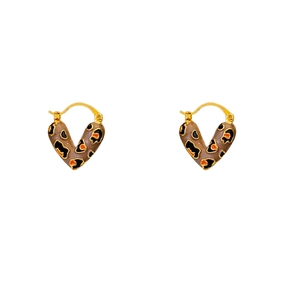 Golden hoop earrings with leopard print heart charms in vintage minimalist style