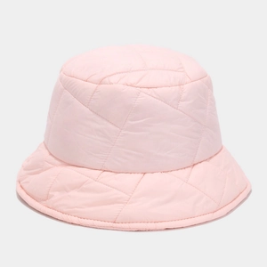 Close-up of pink quilted bucket hat showing geometric stitching and soft padded texture